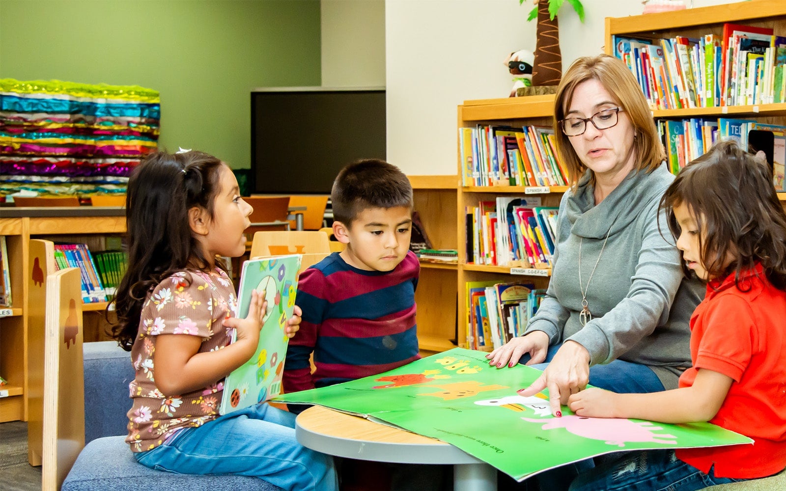 Educare West DuPage teacher leading activity with students